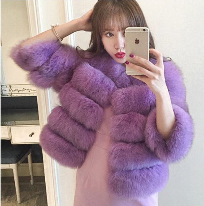 Women’s purple fur cropped jacket with wide collar and horizontal layered bands.